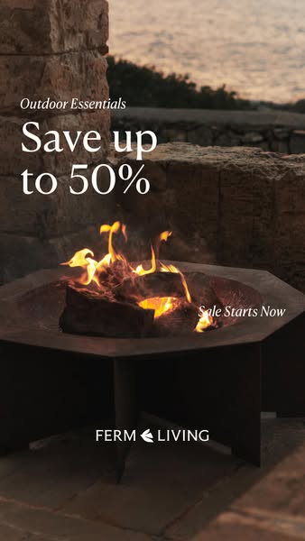 The ad showcases a fire pit, with the text overlay highlighting a sale of up to 50% on outdoor essentials.