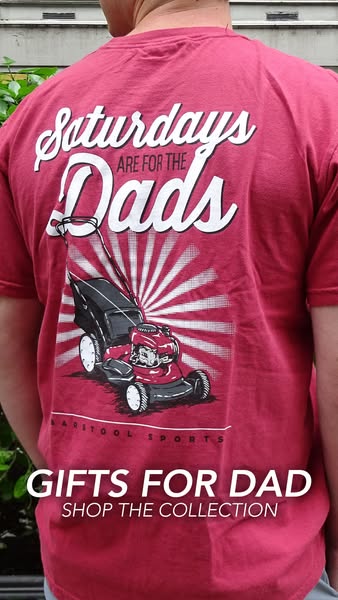 This ad promotes gifts for dads, featuring a t-shirt with a lawnmower and the text 'Saturdays are for the dads'.