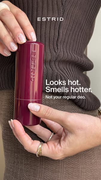 An ad for Estrid deodorant featuring the product being held in someone's hands with the text, "Looks hot. Smell