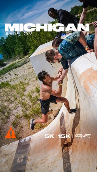 This image ad is for the Michigan Tough Mudder event. It features an image of a participant being pulled up and over an 