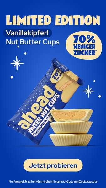 This ad promotes Ahead's limited edition Vanillekipferl Nut Butter Cups, highlighting their reduced sugar content an