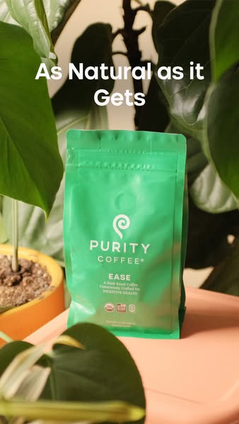 This image ad for Purity Coffee promotes its EASE dark roast coffee, highlighting its naturalness and benefits for diges