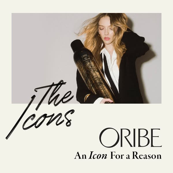 This image ad for Oribe hair product features a model holding the Dry Texturizing Spray. The creative emphasizes the bra