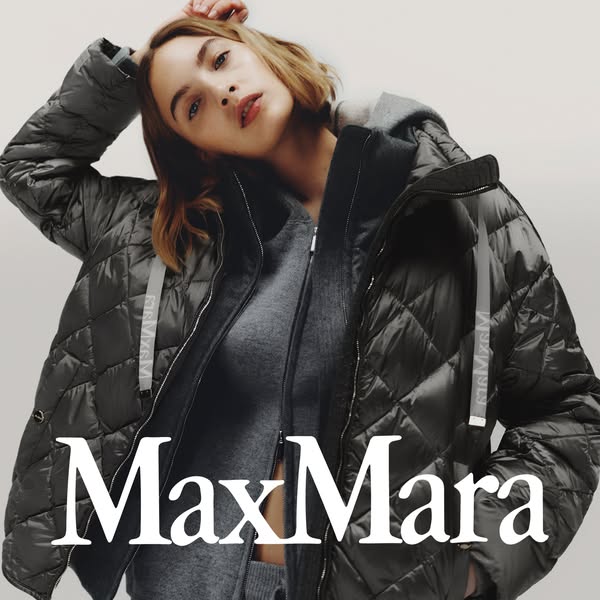 This ad features a woman wearing a quilted Max Mara jacket and sweater. The brand logo is prominently displayed at the b