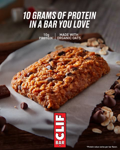 This ad promotes Clif Bar, highlighting its protein content and organic oats. The ad features a close-up shot of the bar