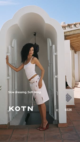 This ad features a woman in a white tank top and skirt, promoting KOTN's brand of slow dressing and soft living.