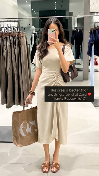 This image ad showcases a mirror selfie of a woman wearing a dress that she purchased at Zara. The ad features a custome