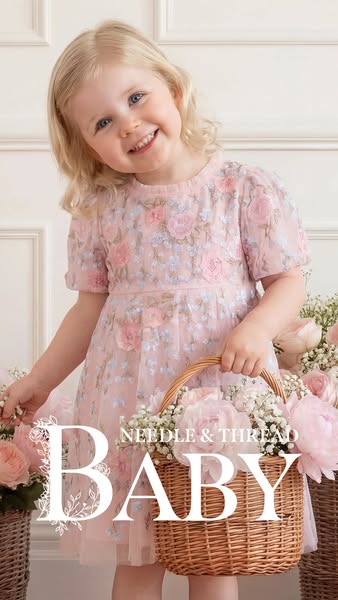 This is an image ad for Needle & Thread Baby, featuring a young girl wearing a pink dress with floral detailing and 