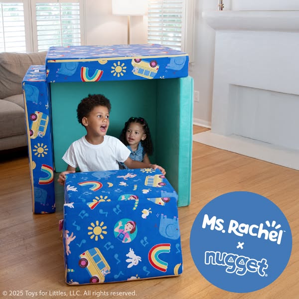 This ad features a Ms. Rachel x Nugget collaboration. Two children are playing inside a fort made of Nugget comfort piec