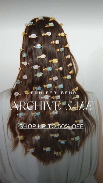 This image ad for Jennifer Behr promotes an archive sale with up to 50% off. The ad features a woman with long brown hai