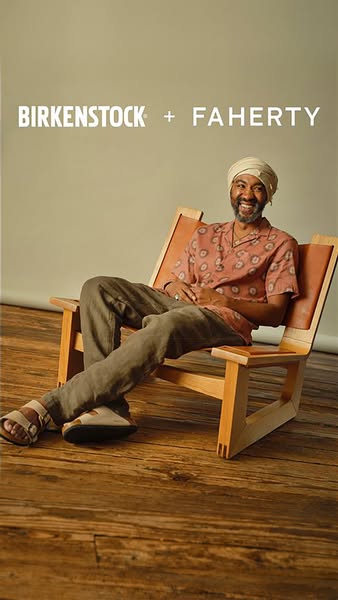 Image showcasing a man sitting in a wooden chair wearing a casual outfit and Birkenstock sandals. The ad announces a col