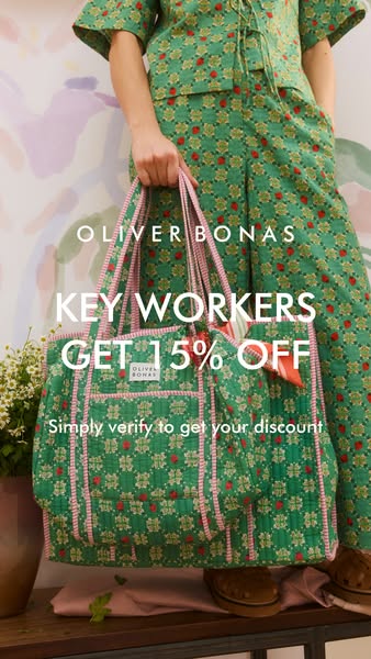 This ad for Oliver Bonas promotes a discount for key workers. The visual shows a tote bag in a green floral pattern, wit