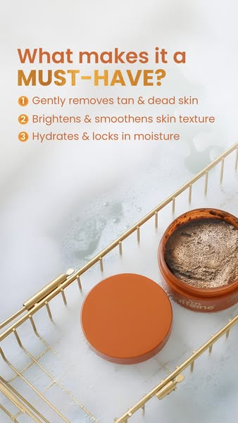This image ad highlights the benefits of a body scrub with text callouts and a flatlay of the product open in a gold wir
