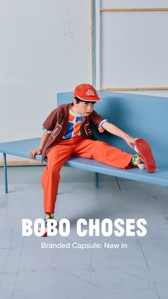 This is a static image ad promoting BOBO CHOSES apparel. The ad features a young boy in a coordinated outfit including a