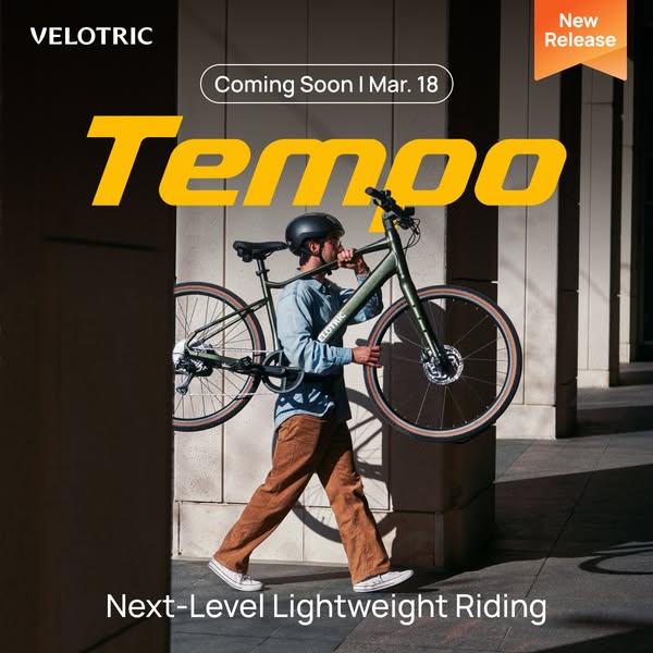 This image ad promotes Velotric's new Tempo e-bike. It features a person carrying the bike on their shoulder while w