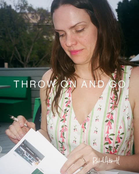 This ad features an image of Rachel Antonoff, presumably the founder of the brand, looking down at papers while sitting 