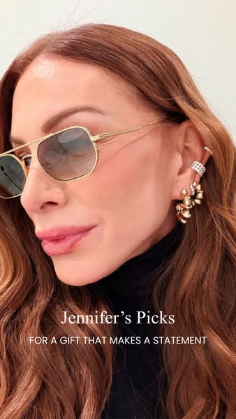 This image ad features a close-up of a woman wearing earrings and sunglasses. The ad is promoting jewelry as a gift.