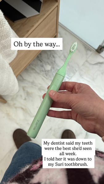 An image ad promoting Suri toothbrushes. The ad features a woman holding the product while sharing a testimonial about h