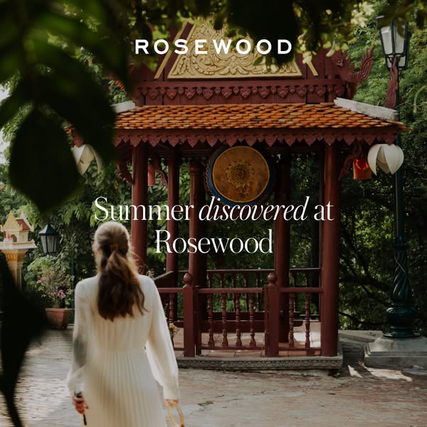 This image ad showcases the Rosewood brand with a focus on summer getaways. The ad features a woman walking towards a tr
