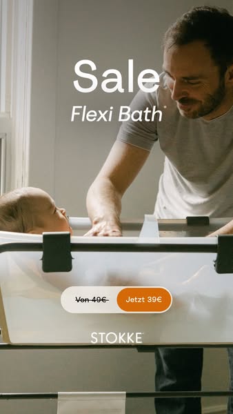 This ad features a father bathing his baby in a Stokke Flexi Bath. The focus is on the discount being offered.