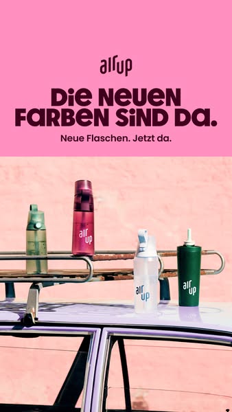 This image ad features four Air Up bottles of different colors on top of a car. The ad announces the arrival of new Air 