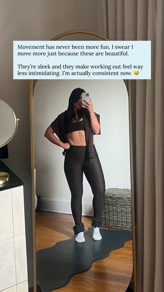 An image ad featuring a woman in workout attire taking a mirror selfie with a testimonial about making working out more 