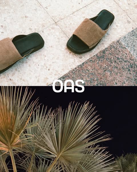 Image showcasing two OAS suede sandal slides. The shoes are cream with a black insole. The background is split between a