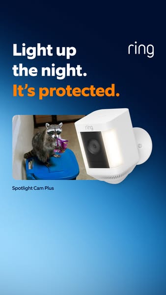 This ad for the Ring Spotlight Cam Plus shows a raccoon getting into a trash can in the dark, which is illuminated by th