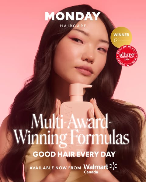 This image ad for MONDAY Haircare features a model holding the product and highlights its award-winning status and avail