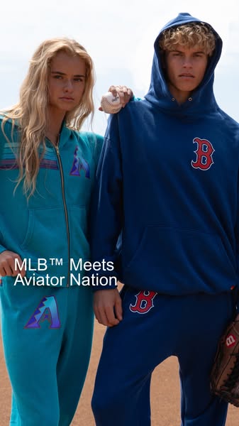 This ad features two models wearing MLB-themed hoodies and sweatpants from Aviator Nation, targeting baseball fans who a