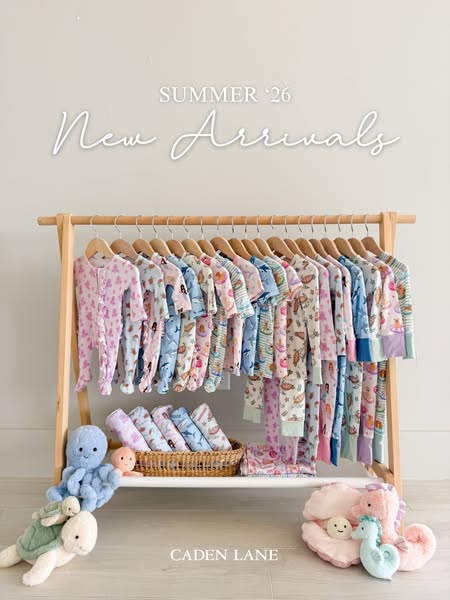 This ad is promoting the new summer line of children's pajamas from Caden Lane. The pajamas are displayed on a cloth