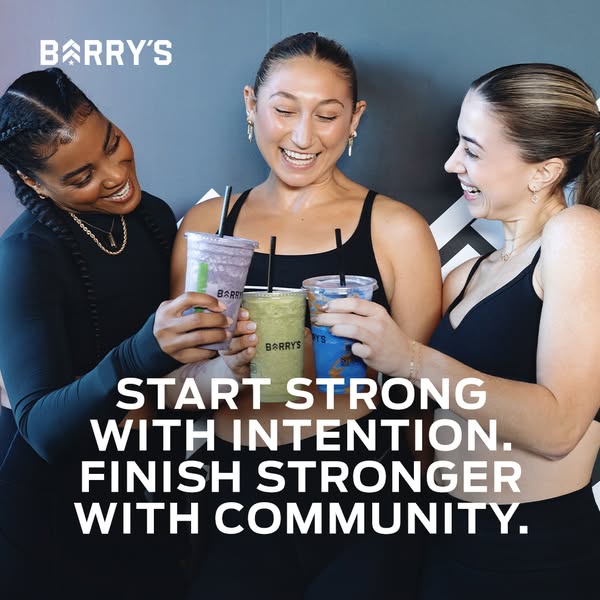 This image ad for Barry's features a group of three women post workout, holding up smoothies to the camera. The ad s