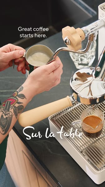 This image ad showcases an individual creating espresso with a professional-style machine, emphasizing the quality and e
