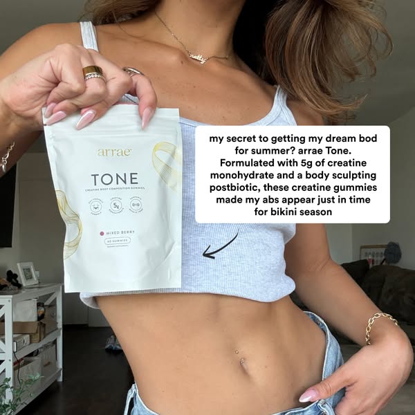 This image ad features a woman holding a bag of Arrae Tone creatine gummies. She is showing her stomach, and there is a 