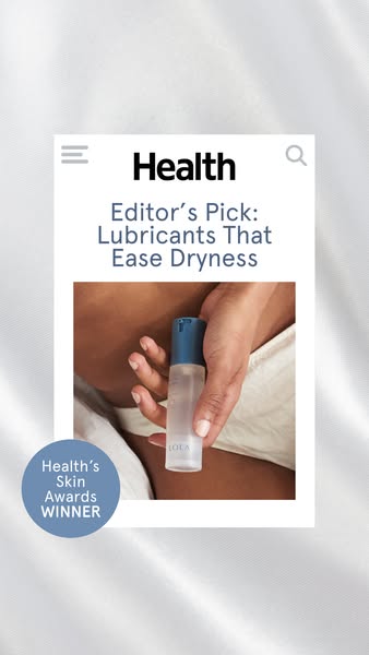 This ad features an image of a magazine article about lubricants with a bottle of LOLA lubricant held over the article.