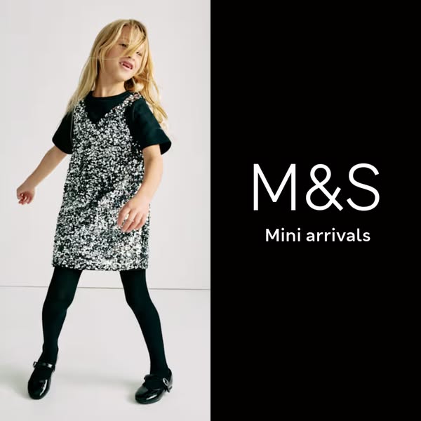 This image ad features a young girl wearing a dress and shows the Marks & Spencer brand logo.