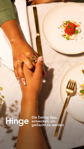 This ad for Hinge uses an image of a couple holding hands over a dinner table to imply the possibility of finding a real