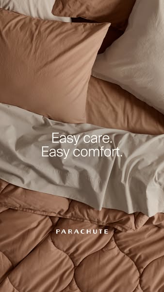 This ad showcases Parachute's bedding. It highlights the bedding's ease of care and comfort through a close-up v