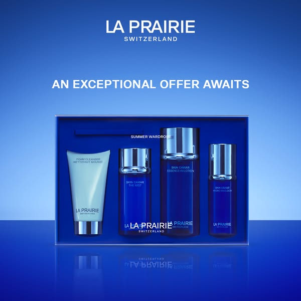 This ad showcases La Prairie's Summer Wardrobe gift set, featuring Skin Caviar products. It aims to convey luxury an