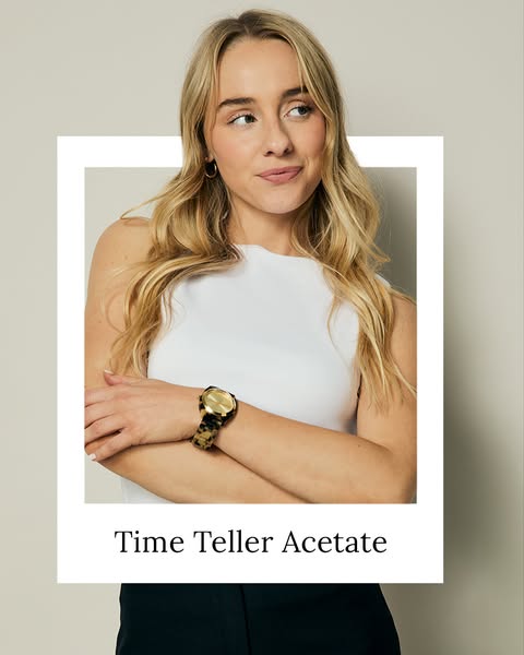 This ad features a woman with blond hair wearing the Time Teller Acetate watch from Nixon. The ad has a clean and classi