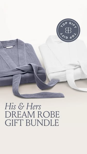 This image ad showcases a 'His & Hers DREAM ROBE GIFT BUNDLE'. The ad features a folded light purple robe ne