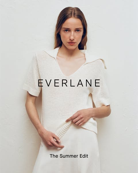 This ad showcases clothing from Everlane's Summer Edit collection. A model poses in a white knit top and skirt again