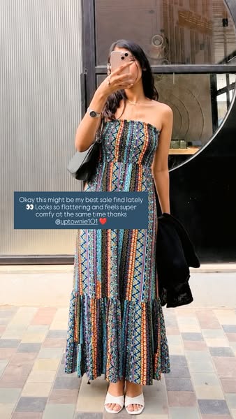 This ad showcases an ankle-length strapless dress with a multi-colored pattern. The model shares a quote about how the d