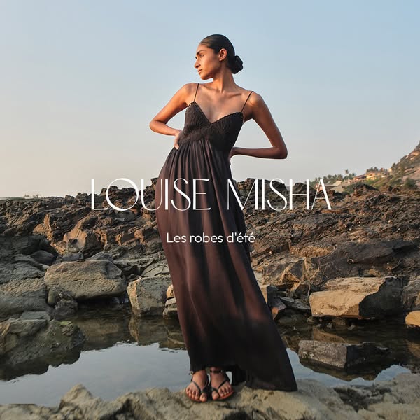 This image ad showcases a Louise Misha summer dress, emphasizing its elegance and suitability for warm weather.
