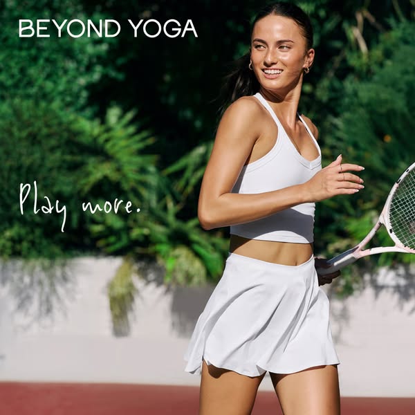 This ad for Beyond Yoga features a woman on a tennis court wearing a white athletic skirt and tank top. The text 'Pl