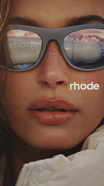 This ad is for Rhode skin care, promoting a lip peptide booster by focusing on the model's face. The product is subt