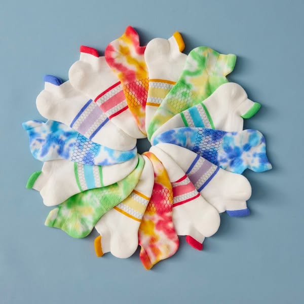 This ad uses a product-centric layout featuring a dozen pairs of socks. The ad focuses on capturing the attention of vie