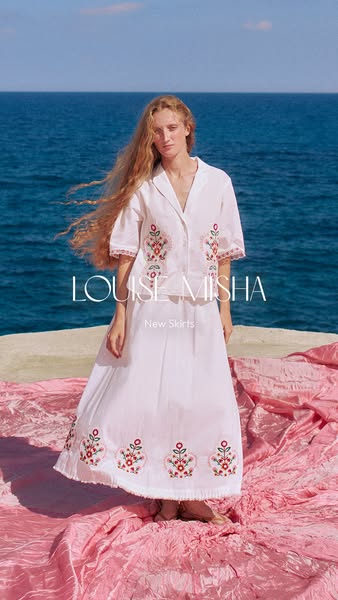 This ad by Louise Misha showcases their new skirts. The ad features a person modeling the skirt with a matching shirt. T