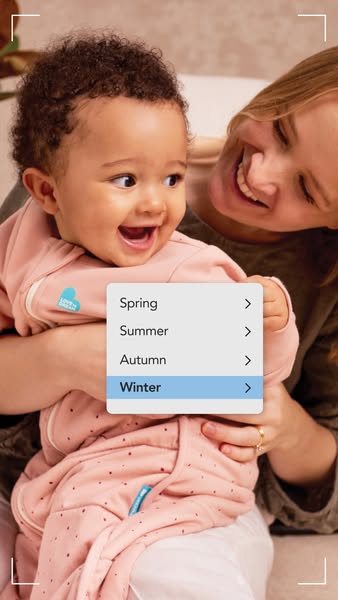 This ad features a baby wearing a Love to Dream sleep suit being held by an adult. A UI element is overlaid on the image