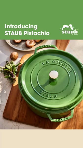 An image ad showcasing a green Staub La Cocotte, emphasizing its aesthetic and functionality.